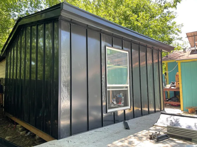 Black standing seam metal wall panels for Metal Roof Installation in Muleshoe